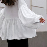 Camicetta vintage con colletto e maniche a sbuffo plissettate