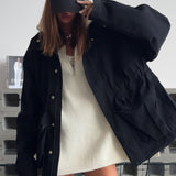 Giacca con tasca portaoggetti e coulisse in vita