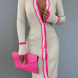 Abito a coste a contrasto con risvolto