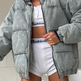 Cappotto con collo alto rilassato in jacquard con stampa a mezzaluna