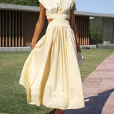 Abito midi da vacanza con tasche e vita tagliata