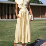 Abito midi da vacanza con tasche e vita tagliata