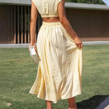 Abito midi da vacanza con tasche e vita tagliata