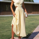 Abito midi da vacanza con tasche e vita tagliata