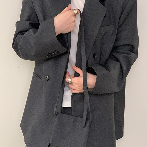 Blazer con cintura in stile pendolare