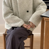 Cappotto alla moda in lana con bottoni automatici