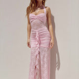 Abito lungo aderente con spacco alto, senza spalline, in pizzo trasparente e patchwork