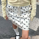 Gonna midi vintage in raso a pois con coulisse