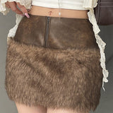 Minigonna a vita bassa con pannelli in pelle sfocata