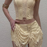 Completo minigonna a vita bassa con top a tubino elegante e solido