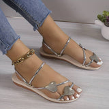 Sandali da donna - Cinturini multipli con dettagli a cuore - Comodità piatta ed elegante