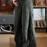 Pantaloni cargo larghi in denim lavato e rovinato