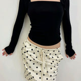 Gonna midi vintage in raso a pois con coulisse