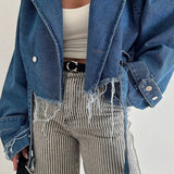 Giacca in denim chic con revers rovinati