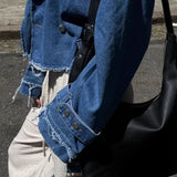 Giacca in denim chic con revers rovinati