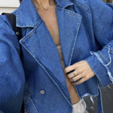 Giacca in denim chic con revers rovinati