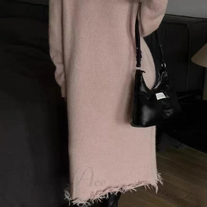 Abito in maglia con bordo grezzo effetto consumato