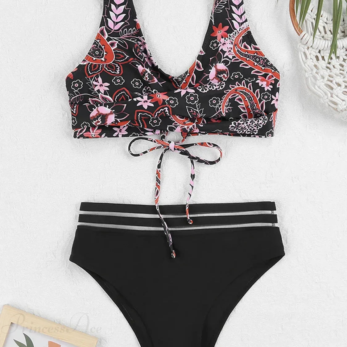 Set due pezzi con stampa a nastro e cinturino con coulisse