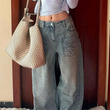 Jeans a gamba larga con strass vintage