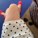 Gonna midi vintage in raso a pois con coulisse