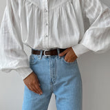 Camicetta con collo alto in jacquard di cotone bianco