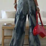 Jeans vintage a vita alta e gamba larga con effetto tie-dye