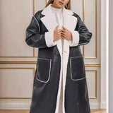 Elegante cappotto in lana d'agnello con cintura in pelle sintetica