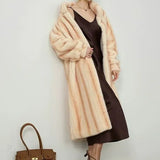 Elegante cappotto in pelliccia sintetica di visone con collo alto