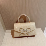 Borsa a tracolla con catena e fiocco di diamanti europeo-americano