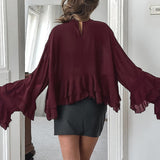 Camicetta vintage in chiffon con volant