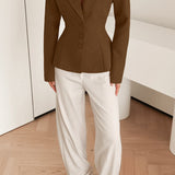 Blazer aderente con scollo a V, spalle imbottite e maniche lunghe