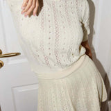 Completo gonna con scollo rotondo e taglio in maglia leggera e solida