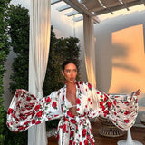 Mini abito con maniche a lanterna e stampa floreale fresca