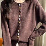 Cardigan in velluto tinta unita con bottoni colorati