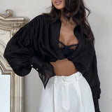 Camicetta vintage in raso con maniche a lanterna