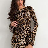 Mini abito aderente con stampa leopardata e schiena scoperta