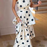 Completo top senza maniche con gonna a balze e scollo all'americana a pois