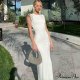 Abito midi elegante e solido in maglia con bottoni alla moda, senza maniche, estivo, con spacchi