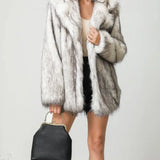 Cappotto di media lunghezza in stile blazer in pelliccia sintetica