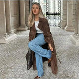 Cappotto doppiopetto con revers in similpelle