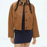 Cappotto doppiopetto con revers in similpelle