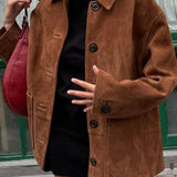 Cappotto doppiopetto con revers in similpelle