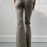 Jeans a zampa leggermente elasticizzati a vita bassa