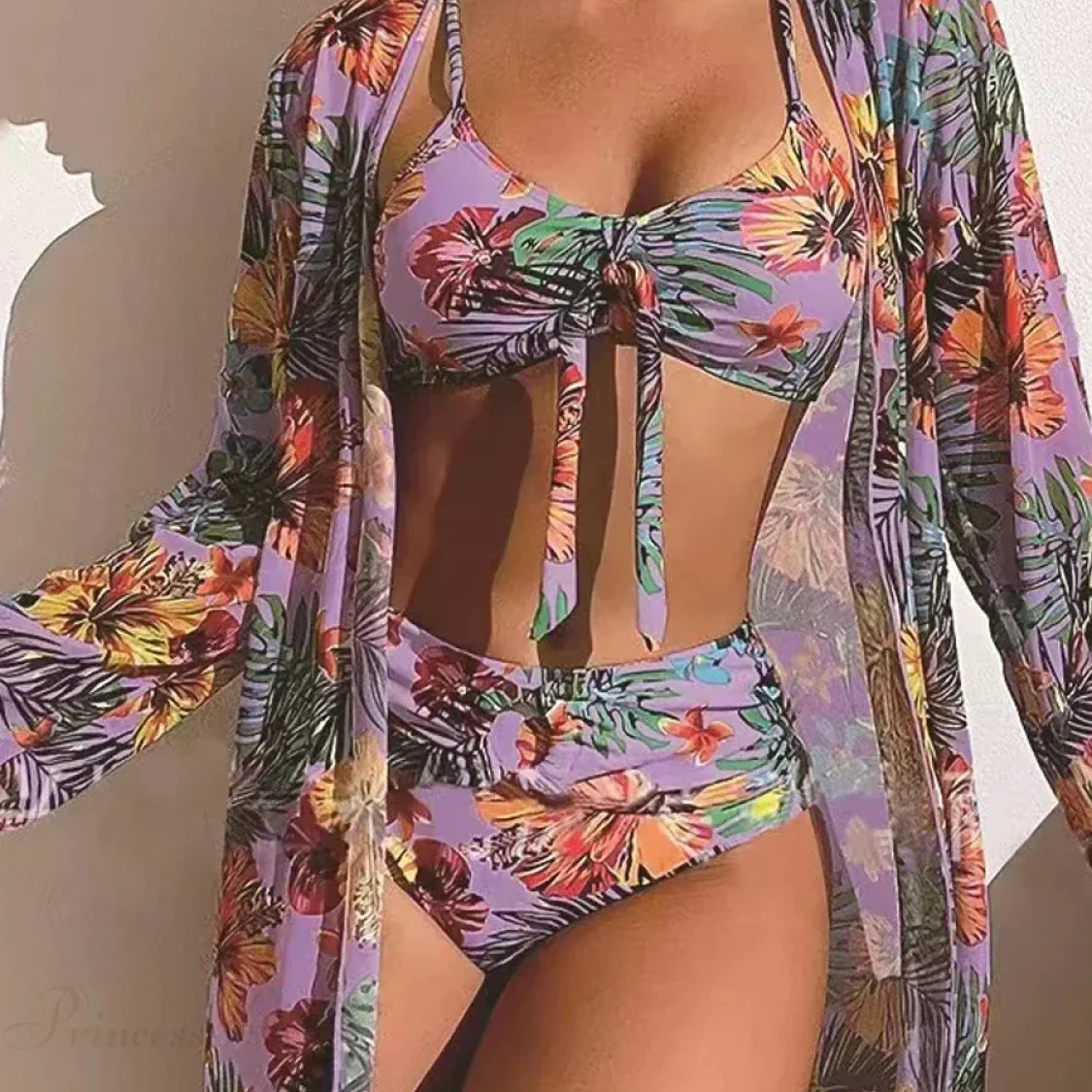 Completo due pezzi con nodo floreale sul davanti e maniche lunghe