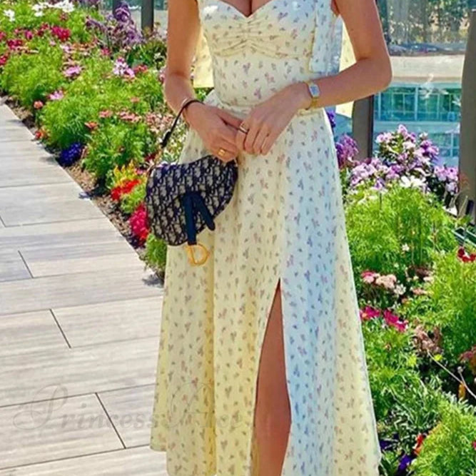 Abito con spacchi e stampa floreale e spalline annodate