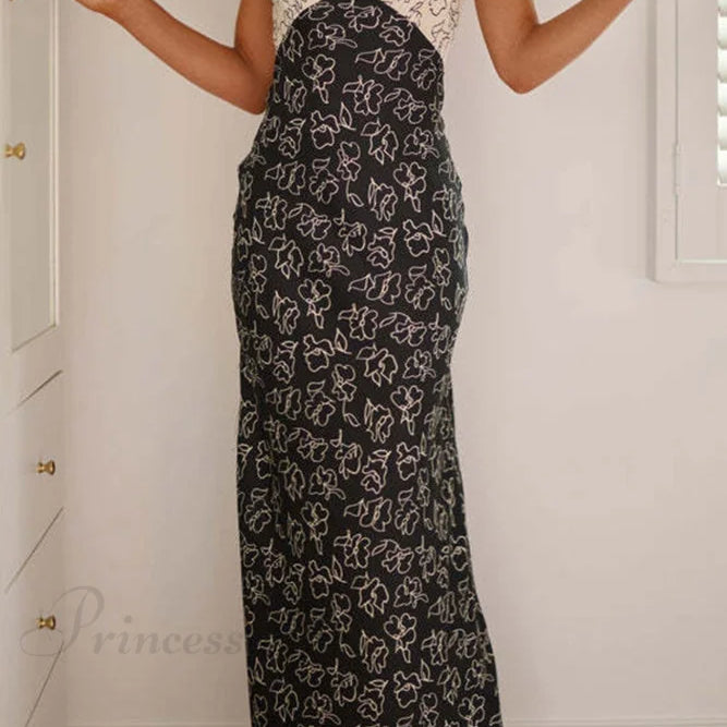 Abito con scollo a V e stampa floreale, dettagli a contrasto e lacci sulla schiena