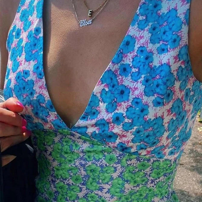 Abito con scollo a V e stampa floreale, dettagli a contrasto e lacci sulla schiena