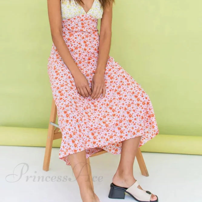 Abito con scollo a V e stampa floreale, dettagli a contrasto e lacci sulla schiena