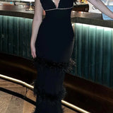 Abito a canotta con strati di pelliccia e strass