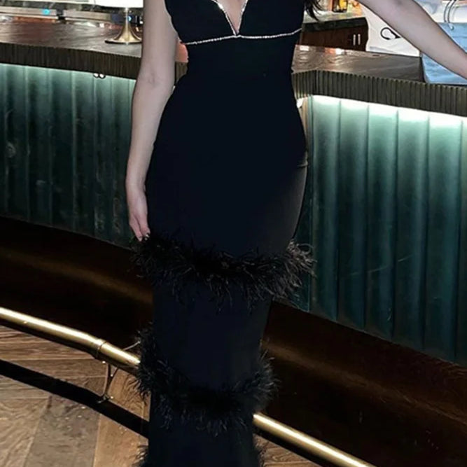 Abito a canotta con strati di pelliccia e strass